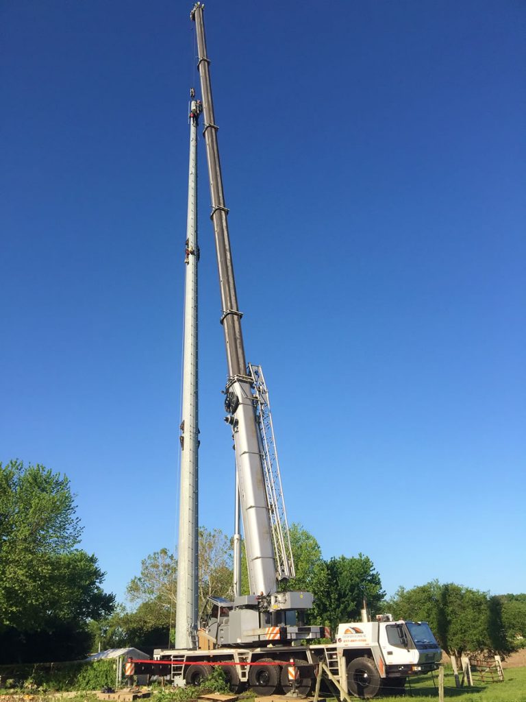 275 ton setting monopole for cell tower.
